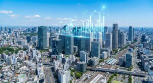 REITと不動産鑑定評価の関係を象徴する東京都心のビル群と金融データ