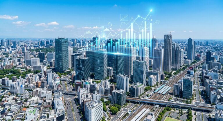 REITと不動産鑑定評価の関係を象徴する東京都心のビル群と金融データ